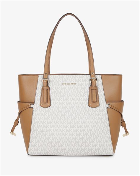 michael kors voyager signature tote vanilla|michael kors zip top tote.